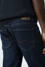 VAQUERO REGULAR FIT OSCURO HOMBRE 10063579_E1032